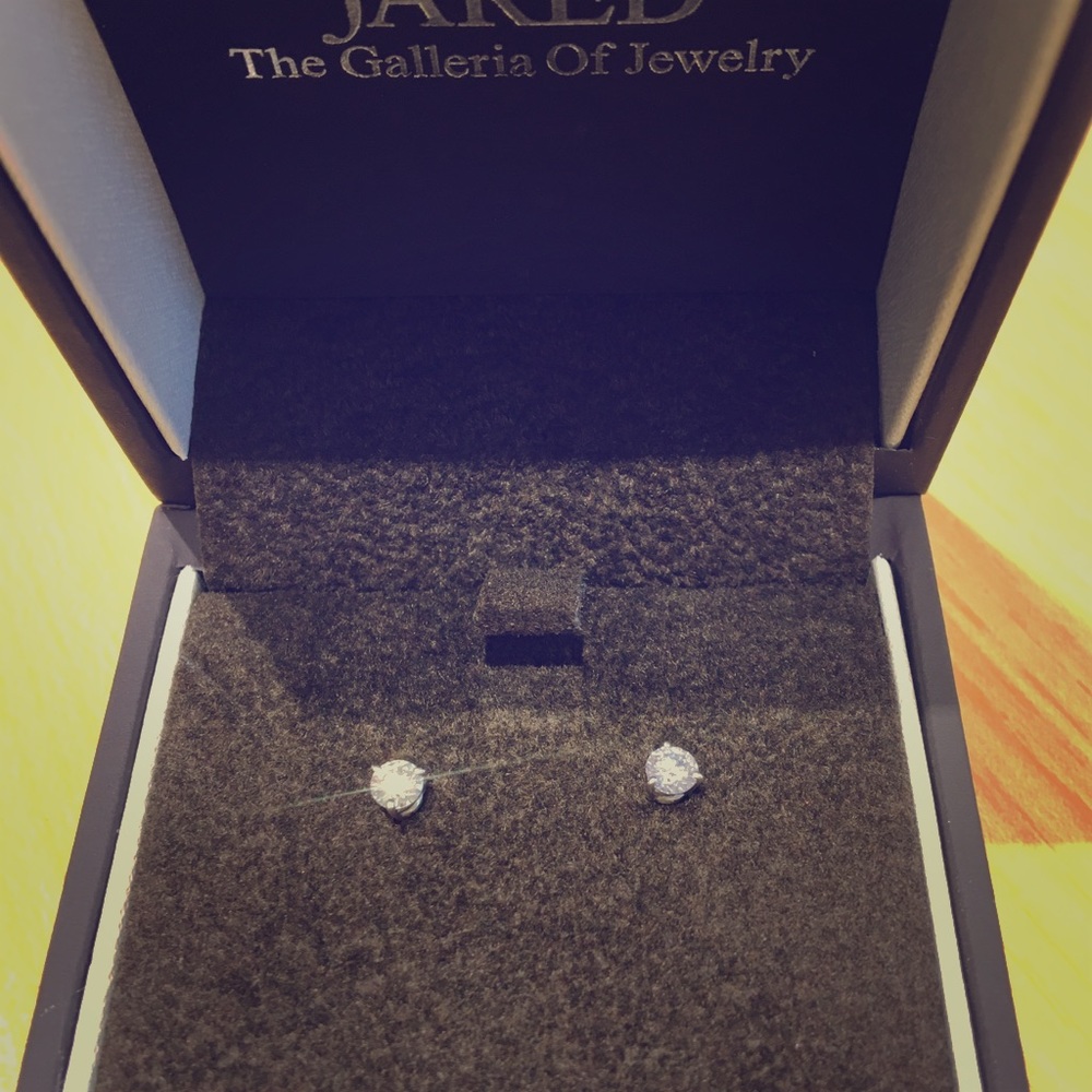 Platinum and Leo Diamond earrings